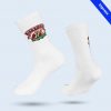 A pair of white mid-calf socks featuring a color illustration of a king drinking beer and the text “Bierkönig Schinkenstrasse.” In the upper right corner is a blue band with the word “Express.”
