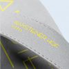 Close-up of the gray fabric strap with reinforced stitching, showing the sharpness of the “RAMSTEINER HOF HOTEL” logo printed in yellow.